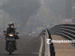 foto_kabut_asap_masih_menyelimuti_kota_pekanbaru_1.jpg