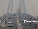 foto_kabut_asap_masih_menyelimuti_kota_pekanbaru_2.jpg