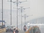 foto_kabut_asap_semakin_pekat_di_pekanbaru_2.jpg