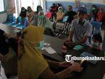 foto_pasien_ispa_di_puskesmas_pekanbaru_meningkat_1.jpg
