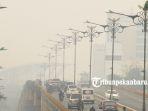 foto_suasana_pekanbaru_yang_diselimuti_kabut_asap_1.jpg