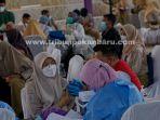 foto_vaksinasi_bagi_pelajar_di_pekanbaru_1.jpg