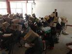 guru-suruh-siswa-tutup-pakai-kepala-saat-ujian.jpg