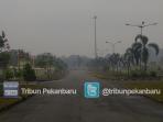 hujan-masih-sisakan-kabut-asap-di-pelalawan_20150803_093250.jpg