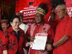 ini-profil-dan-partai-politik-john-wempi-wetipo.jpg