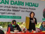 istri-bupati-dairi-kain-ulos-dana-csr.jpg