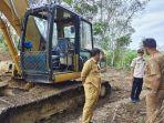 jalan_amblas_di_kuansing_pemkab_kuansing_gesa_buat_jalan_alternatif.jpg