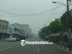 kabut-asap-akibat-karhutla-mulai-terlihat-di-pemukiman-warga-di-dumai-dan-bengkalis.jpg