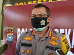 kapolresta-pekanbaru-kombes-pol-nandang-mumin-wijaya-pakai-masker.jpg