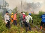 karhutla-pelawan_20180727_110307.jpg