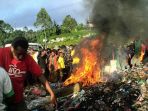 kasus-pembakaran-tertuduh-tukang-sihir-di-papua-nugini_20171121_193336.jpg