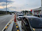 kendaraan_di_tol_pekanbaru-bangkinang_1.jpg
