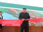 kim-jong-un-menghadiri-potong-pita-sebuah-pabrik-pupuk.jpg