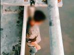 laki-laki-tergantung-di-jembatan-di-inhil.jpg
