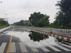 masih_baru_jalan_pramuka_selatpanjang_riau_tergenang_air.jpg