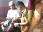 maswir_warga_kuansing_riau_lolos_dari_terkaman_buaya_kaki_berdarah.jpg