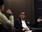 menteri-hukum-dan-ham-yasonna-laoly-berbincang-dengan-tim-tribunnews.jpg