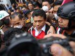 misteri-buku-hitam-yang-dibawa-ferdy-sambo-saat-tahap-2-di-kejagung-pengacara-ungkap-isinya.jpg