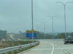 mobil-lewati-tol-pekbang-riau.jpg
