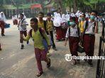murid-sd-di-pekanbaru-akhirnya-diliburkan-karena-kabut-asap_4.jpg