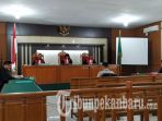 oknum-polisi-ini-dituntut-tiga-tahun-penjara_20181016_211541.jpg