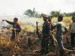 padamkan-titik-api-riau.jpg