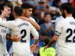 para-pemain-real-madrid-merayakan-gol-yang-dicetak-oleh-marco-asensio.jpg