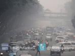 pekanbaru-kembali-diselimuti-kabut-asap-3_20151018_200828.jpg
