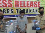 pelaku-ar-27-tak-berkutik-saat-ditampilkan-dalam-rilis-pers-polres-tarakan-selasa-1812022.jpg