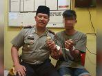 pelaku-penganiayaan-berinisial-jh-alias-irwan-di-polsek-tenayan-raya.jpg