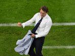 pelatih-italia-roberto-mancini-bereaksi-pada-akhir-pertandingan-perempat-final-uefa-euro-2020.jpg