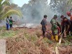 pemadaman-dan-pendinginan-di-desa-sungai-mas.jpg