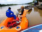 pencarian-terhadap-korban-yang-tenggelam-di-sungai-kampar-kecamatan-bunut.jpg