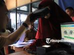 perekaman-e-ktp-disdukcapil-marpoyan-damai_20171213_180322.jpg