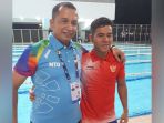 perenang-zaki-zulkarnaen-bersama-ketua-npc-kampar-zulkifli_20181009_222644.jpg