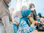 pertagas-berdayakan-kader-pkk-di-riau-lewat-keterampilan-menjahit.jpg