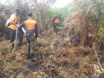 petugas-bpbd-sedang-berupaya-melakukan-pemandam-kebakaran-hutan-dan-lahan.jpg