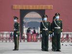 petugas-polisi-china-di-beijing-mengenakan-masker.jpg
