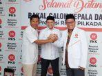pilkada-bengkalis-Khairul-Umam-dan-Indra-Gunawan-Eet.jpg
