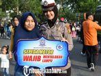 polwan-cantik-curi-perhatian-pengunjung-car-free-day-di-pakanbaru-sosialisasi-tertib-berlalu-lintas.jpg