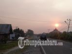 rengat-ditutupi-kabut-asap-tipis-sore-tadi_20180928_210610.jpg