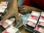 rupiah-semakin-melemah_20141216_20150709_132847.jpg