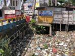 sampah-di-aliran-sungai-kecamatan-limapuluh.jpg