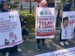 sejumlah-mahasiswa-fakultas-hukum-universitas-lancang-kuning-melakukan-aksi-damai.jpg