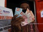 sejumlah-warga-mendatangi-kantor-pos-jalan-sudirman-pekanbaru.jpg<pf>penyaluran-bantuan-sosial-tunai-tahun-2020.jpg<pf>bantuan-sosial-tunai-tahap-i-tahun-2020.jpg<pf>pembayaran-tahap-i-bansos-tahun-2020-dari-kementerian-sosial-republik-indonesia.jpg