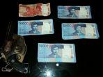uang-palsu-diambil-dari-dalam-kutang-pada-saat-belanja-di-pasar-segini-jumlah-yang-ditemukan-polisi.jpg