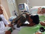 uas-jenguk-guru-sakit1_20181030_142040.jpg