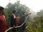 upaya-pemadaman-titik-api-di-kecamatan-kuala-kampar-pelalawan-ok.jpg