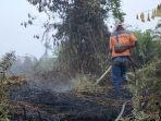 upaya_pendinginan_masih_dilakukan_di_sejumlah_titik_terbakar_di_bengkalis.jpg