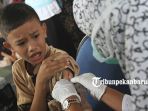 vaksinasi-imunisasi-measles-rubella-mr-sd-an-namiroh-1_20181024_142650.jpg